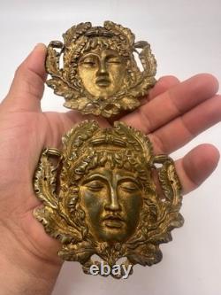 Paire de mascarons décoratifs en bronze XIXe éléments de meubles