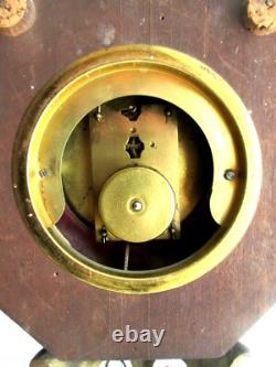 Pendule Boulangère Napoléon III, octogonale, céramique rouge émaillée et bronze