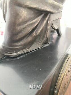 Pendule Napoléon III Marbre noir, sculpture patine Bronze mouvement rousselin