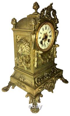 Pendule en bronze Napoléon III riche en bronze têtes de lions, glands