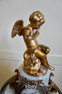 Pendule en bronze doré et onyx Napoléon III amour angelot putti