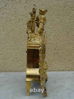 Pendule en bronze doré style rocaille dépoque Napoléon III