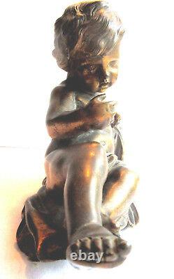 Sculpture statue de pendule en bronze, Napoléon III Angelot chérubin allongé