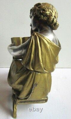 Statue de pendule Napoléon III en bronze doré et argenté Femme à la lecture
