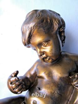 Statue de pendule en bronze, sculpture Napoléon III Angelot chérubin allongé