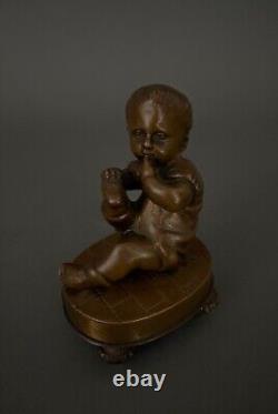 Sujet en bronze XIXe représentant un bébé assis Napoléon III M3065
