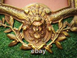 Superbe cadre à suspendre en bronze doré pour miroir tête d'Apollon et de faune