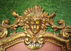 Superbe cadre à suspendre en bronze doré pour miroir tête d'Apollon et de faune