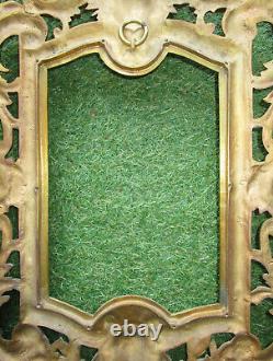 Superbe cadre à suspendre en bronze doré pour miroir tête d'Apollon et de faune