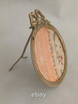 Superbe cadre porte photo rond en bronze et en laiton A décor noud Napoléon III
