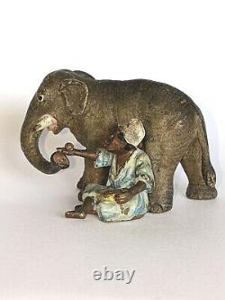 Superbe petit éléphant et son jeune cornac en bronze de Vienne polychrome ancien