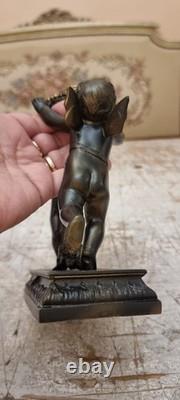 Unique French dark bronze Candle holder With Two cherub puttos holding it
